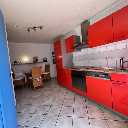 Orange Kitchen By Restaurant Wiesenau Apartment Prerow