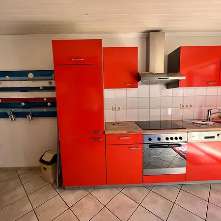 Orange Kitchen By Restaurant Wiesenau Apartment